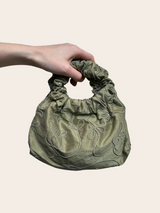 Green embroidered bag